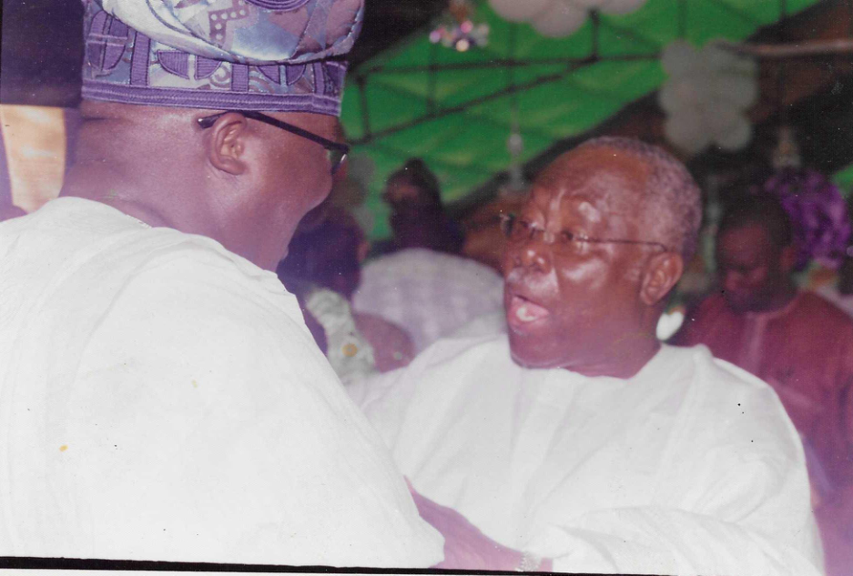 DOHERTY WITH CHIEF BODE GEORGE AT IRE DURING THE BURIAL OF S.M AFOLABI
